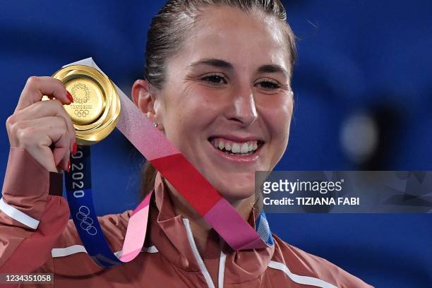 Gold medallist Switzerland's Belinda Bencic poses with her medal during the Tokyo 2020 Olympic Games women's singles tennis medal ceremony at the...