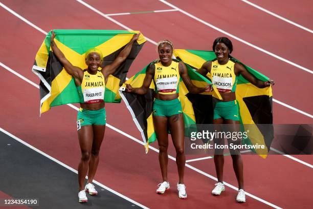 Team Jamaica's runner-up Shelly-Ann Fraser-Pryce, first-place finisher Elaine Thompson Herah and third-place finisher Shericka Jam Jackson celebrate...