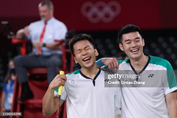 Lee Yang and Wang Chi-Lin of Team Chinese Taipei celebrate as they win against Li Jun Hui and Liu Yu Chen of Team China during the Men's Doubles Gold...