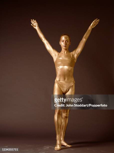 108 Gold Body Paint Portrait Stock Photos, High-Res Pictures, and