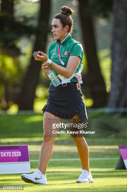 Maria Fassi of Team Mexico on the practice range during the third round of Mens Individual Stroke Play Golf on day eight of the Tokyo 2020 Olympic...