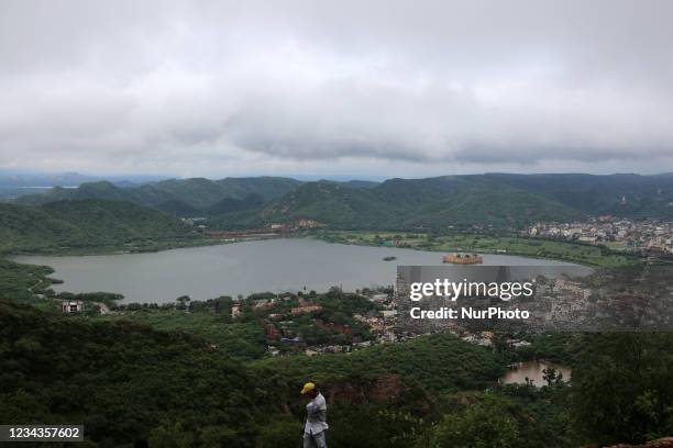 View of 'Jal Mahal' as clouds hover over the city on a rainy day during the monsoon season in Jaipur, Rajasthan, India, Saturday, July 31, 2021.