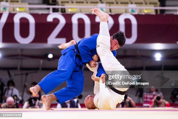 Henk Grol of Netherlands and Bekmurod Oltiboev of Uzbekistan compete during Judo on day eight of the Tokyo 2020 Olympic Games at Nippon Budokan on...