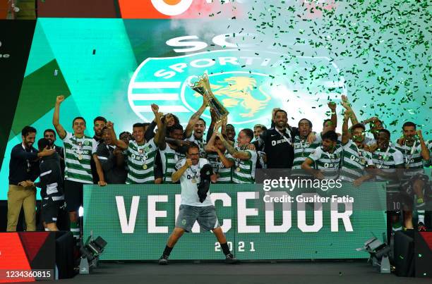 Sporting CP players celebrate winning the Portuguese SuperCup with trophy at the end of the Portuguese SuperCup match between Sporting CP and SC...