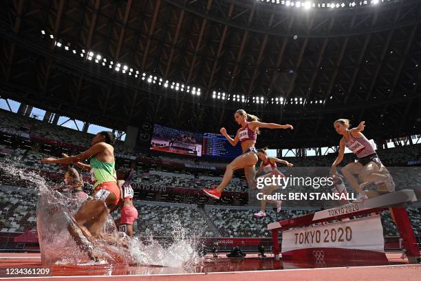 S Emma Coburn competes in the women's 3000m steeplechase heats during the Tokyo 2020 Olympic Games at the Olympic Stadium in Tokyo on August 1, 2021.