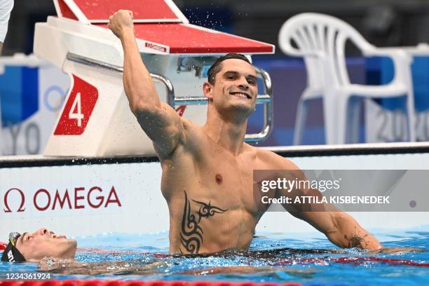 France's Florent Manaudou reacts after winning silver in the final of the men's 50m freestyle swimming event during the Tokyo 2020 Olympic Games at...