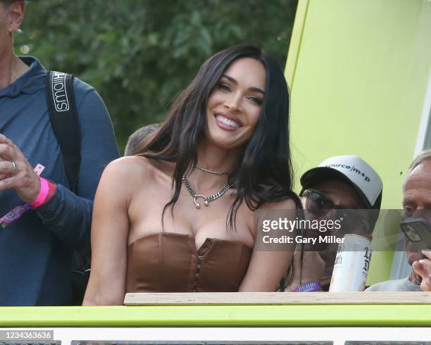 Megan Fox attends Machine Gun Kelly's performance during day three of the 30th anniversary of Lollapalooza at Grant Park on July 31, 2021 in Chicago,...