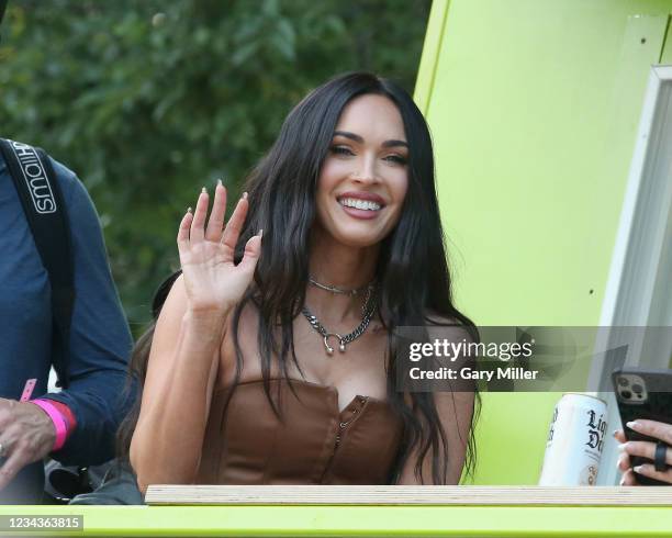 Megan Fox attends Machine Gun Kelly's performance during day three of the 30th anniversary of Lollapalooza at Grant Park on July 31, 2021 in Chicago,...