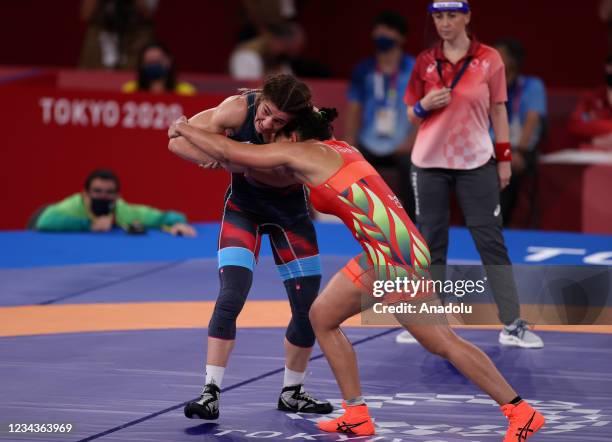 Yasemin Adar of Turkey and Aline Silva of Brazil compete during their Women's Freestyle 76 kg in the Tokyo 2020 Olympic Games at Makuhari Messe Hall...