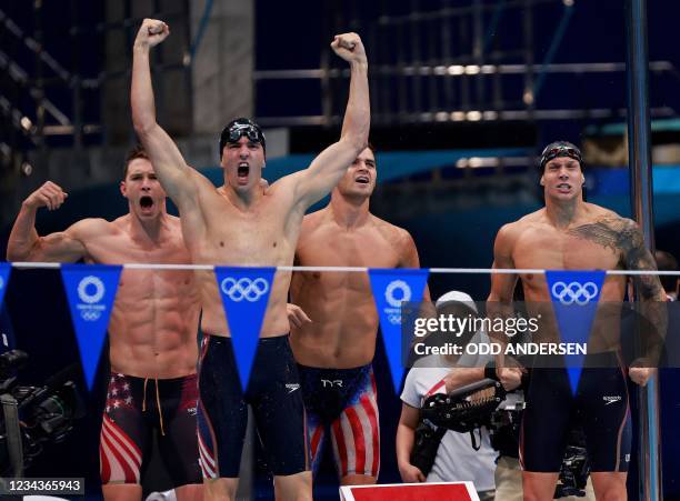S Ryan Murphy, USA's Zach Apple, USA's Michael Andrew and USA's Caeleb Dressel celebrate winning to take gold in the final of the men's 4x100m medley...