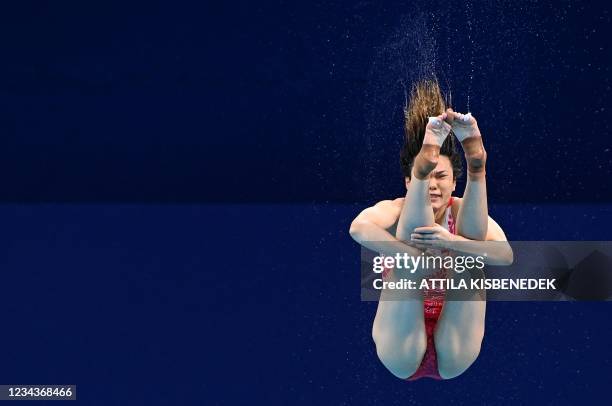 China's Shi Tingmao competes in the women's 3m springboard diving final event during the Tokyo 2020 Olympic Games at the Tokyo Aquatics Centre in...