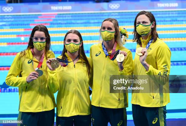 Gold medalists Emma McKeon of Australia, Chelsea Hodges of Australia, Cate Campbell of Australia and Emma McKeon of Australia pose with their medal...