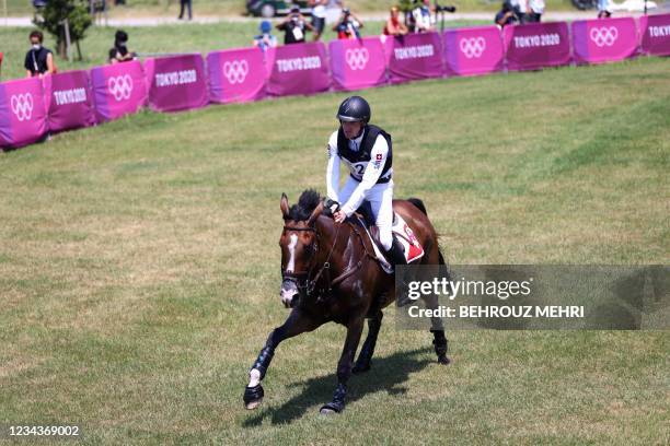 Switzerland's Robin Godel riding Jet Set competes in the equestrian's eventing team and individual cross country during the Tokyo 2020 Olympic Games...