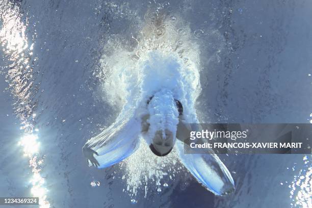 An underwater view shows Russia's Mariia Poliakova after completing a dive in the women's 3m springboard diving final event during the Tokyo 2020...
