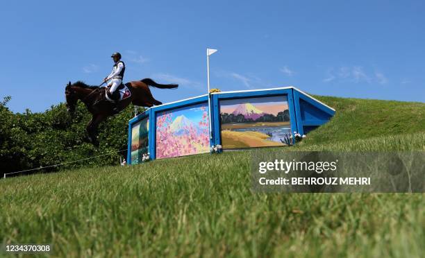 Switzerland's Robin Godel riding Jet Set competes in the equestrian's eventing team and individual cross country during the Tokyo 2020 Olympic Games...