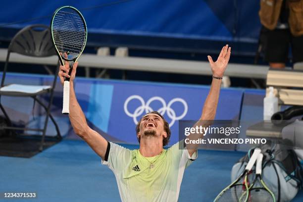 Germany's Alexander Zverev celebrates winning the Tokyo 2020 Olympic men's singles tennis final match against Russia's Karen Khachanov at the Ariake...