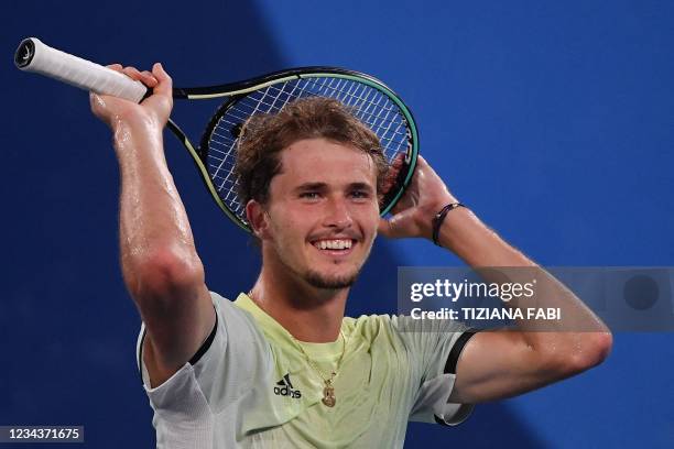 Germany's Alexander Zverev celebrates winning the Tokyo 2020 Olympic men's singles tennis final match against Russia's Karen Khachanov at the Ariake...