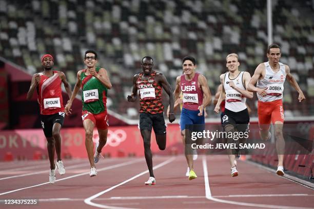 Poland's Patryk Dobek crosses the finish line to win ahead of second-placed Kenya's Emmanuel Kipkurui Korir and third-placed Mexico's Jesus Tonatiu...