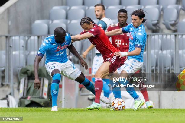 Kalidou Koulibaly of SSC Neapel, Leroy Sane of Bayern Muenchen and Eljif Elmas of SSC Neapel battle for the ball during the Pre-Season Match between...