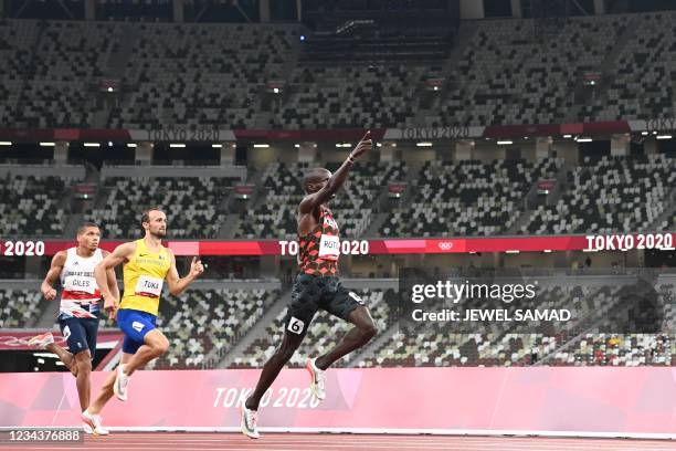 Kenya's Ferguson Cheruiyot Rotich celebrates winning ahead of second-placed Bosnia-Herzegovina's Amel Tuka and Britain's Elliot Giles in the men's...