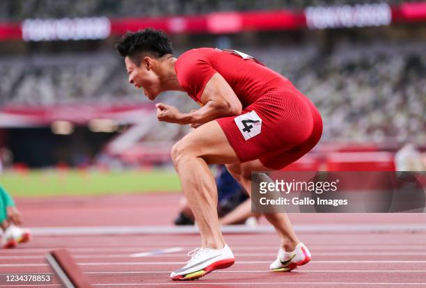 Bingtian Su of Team China reacts after winning his semi final in the mens 100m during the evening session of the Athletics event on Day 9 of the...