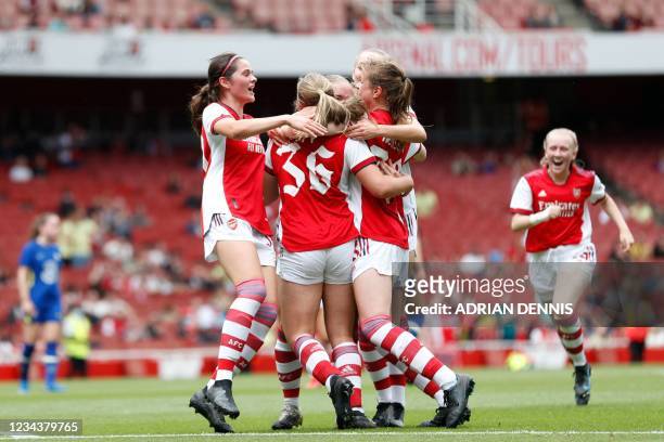 Arsenal's Freya Jupp celebrates with teammates after scoring a goal during the pre-season friendly women's football match between Arsenal and Chelsea...