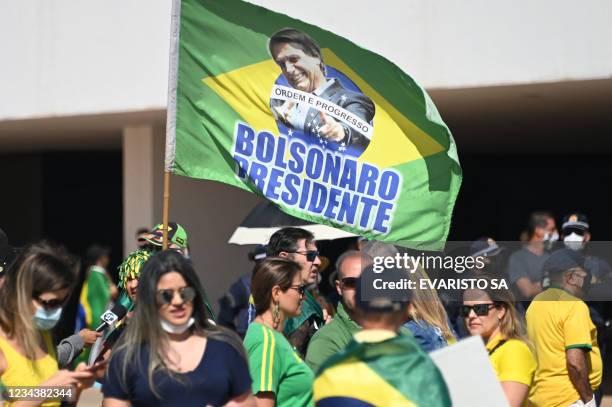 Demonstrators take part in a rally in support of Brazilian President Jair Bolsonaro and calling for a printed vote model at Esplanade of Ministries...