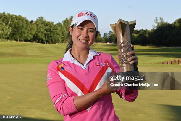 Pajaree Anannarukarn of Thailand poses with the trophy after her victory on the second playoff hole during the final round of the ISPS HANDA World...