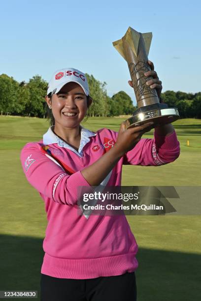 Pajaree Anannarukarn of Thailand poses with the trophy after her victory on the second playoff hole during the final round of the ISPS HANDA World...