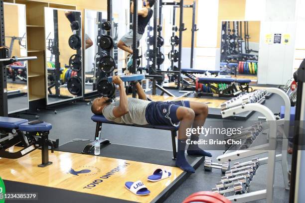 Khris Middleton of the USA Men's National Team lifts weights during the USAB Men's National Team practice on August 1, 2021 in Tokyo, Japan. NOTE TO...