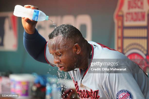 Miguel Sano of the Minnesota Twins cools off in the dugout after the second inning against the St. Louis Cardinals at Busch Stadium on August 1, 2021...