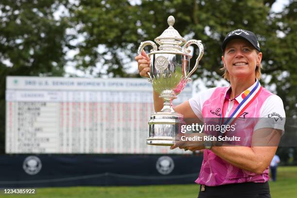 Annika Sorenstam of Sweden holds up the trophy after winning the 2021 U.S. Senior Women's Open Championship at at Brooklawn Country Club on August 1,...