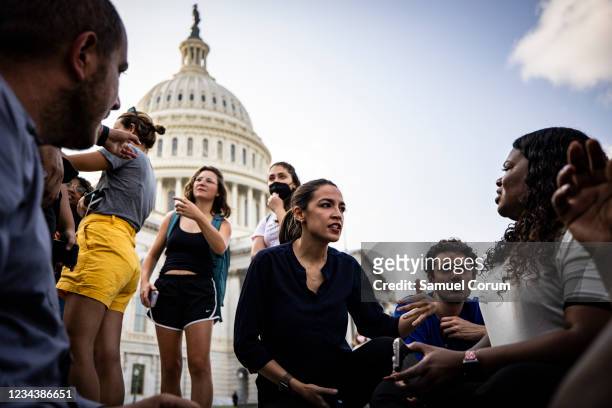 Representatives Alexandria Ocasio-Cortez and Cori Bush continue their protest for an extension of the eviction moratorium on the steps to the House...
