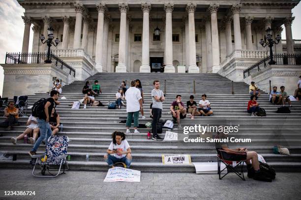 Activists occupy the steps to the House of Representatives with U.S. Rep. Cori Bush as they continue their protest for an extension of the eviction...