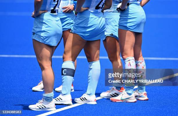 Argentina's Maria Victoria Granatto, captain Maria Noel Barrionuevo and Agustina Albertarrio are seen after defeating Germany 3-0 in their women's...