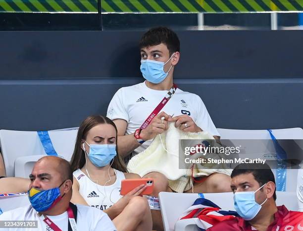 Tokyo , Japan - 2 August 2021; Tom Daley of Great Britain knits during the preliminary round of the men's 3m springboard at the Tokyo Aquatics Centre...