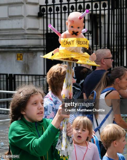 Protest against vaccines for children in London. Protesters outside Downing Street.