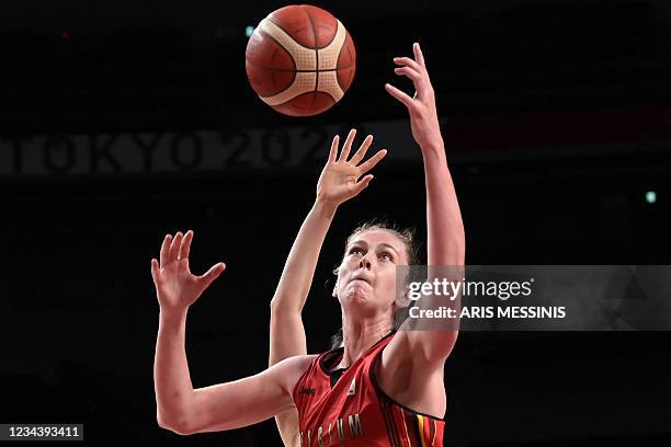 Belgium's Emma Meesseman jumps for the ball in the women's preliminary round group C basketball match between China and Belgium during the Tokyo 2020...