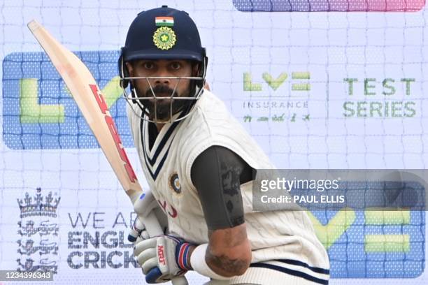 India's captain Virat Kohli bats in the nets during a training session at Trent Bridge Cricket Ground in Nottingham, central England on August 2,...