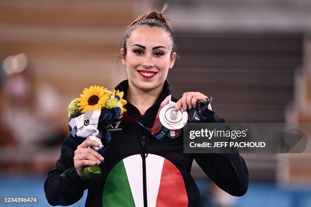 Silver medallist Italy's Vanessa Ferrari poses during the podium ceremony of the artistic gymnastics women's floor exercise during the Tokyo 2020...