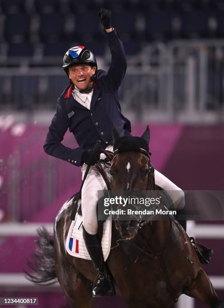 Tokyo , Japan - 2 August 2021; Nicolas Touzaint of France riding Absolut Gold celebrates after his round in the eventing jumping individual final at...