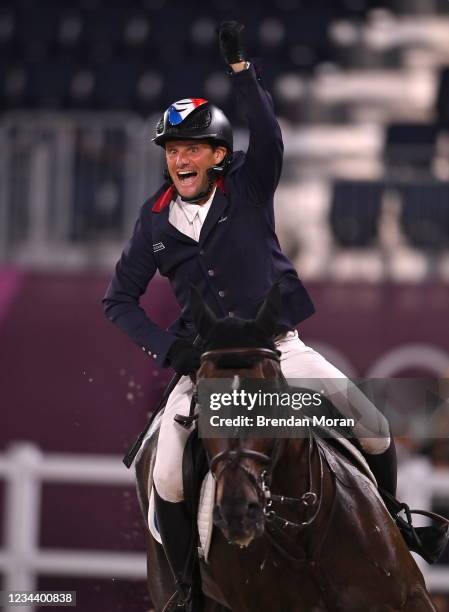 Tokyo , Japan - 2 August 2021; Nicolas Touzaint of France riding Absolut Gold celebrates after his round in the eventing jumping individual final at...