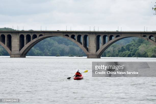 Boater kayaks on the Potomac River amid novel coronavirus outbreak on May 29, 2020 in Washington, DC. The Coronavirus pandemic has spread to many...
