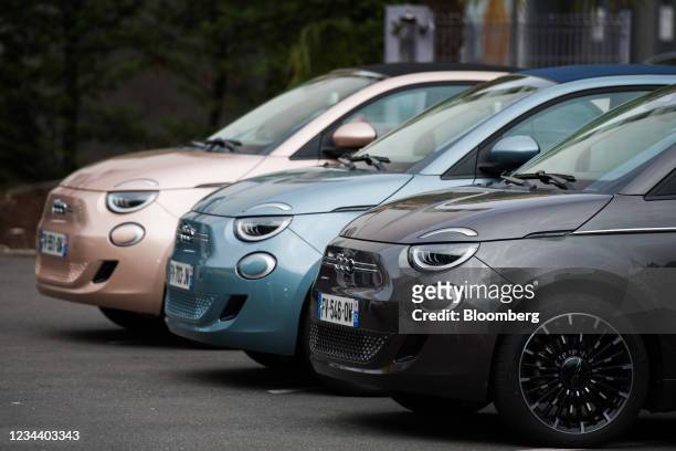 Fiat 500e electric automobiles outside a Fiat showroom, operated by Stellantis NV, in Paris, France, on Monday, Aug. 2, 2021. Stellantis reports...