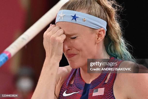 S Sandi Morris reacts in pain during the women's pole vault qualification during the Tokyo 2020 Olympic Games at the Olympic Stadium in Tokyo on...