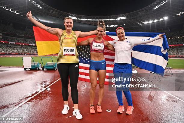 Silver medallist Germany's Kristin Pudenz, gold medallist USA's Valarie Allman and bronze medallist Cuba's Yaime Perez pose after the women's discus...