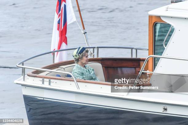 Imelda Staunton is seen on a boat made to look like a Royal yacht tender in the harbour during filming for the Netflix series "The Crown" on August...