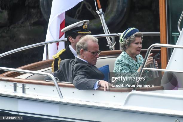 Imelda Staunton and other cast members are seen on a boat made to look like a Royal yacht tender in the harbour during filming for the Netflix series...