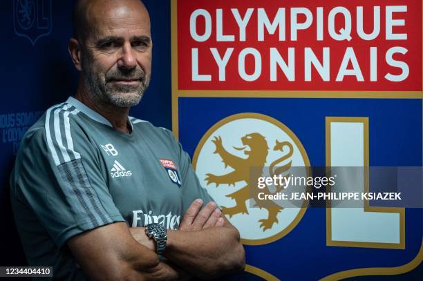 Olympique Lyonnais Dutch head coach Peter Bosz poses at the Groupama Stadium, in Decines-Charpieu, near Lyon, south-central France, on August 2, 2021.