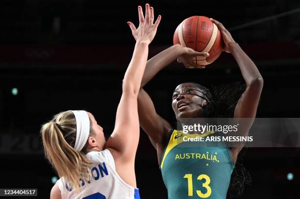 Australia's Ezi Magbegor takes a shot past Puerto Rico's Ali Gibson in the women's preliminary round group C basketball match between Australia and...